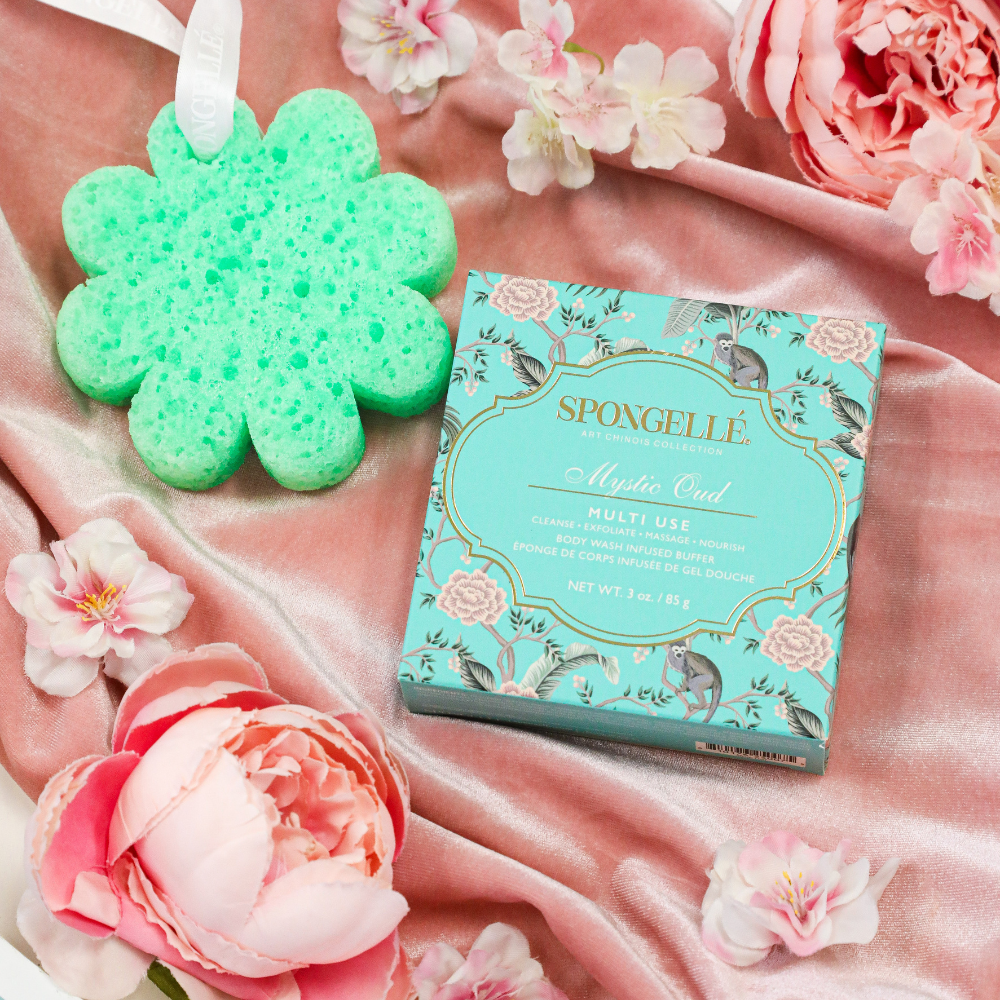 Spongellé Mystic Oud Art Chinois multi-use body buffer, infused with body wash, featuring intricate design and soft texture.