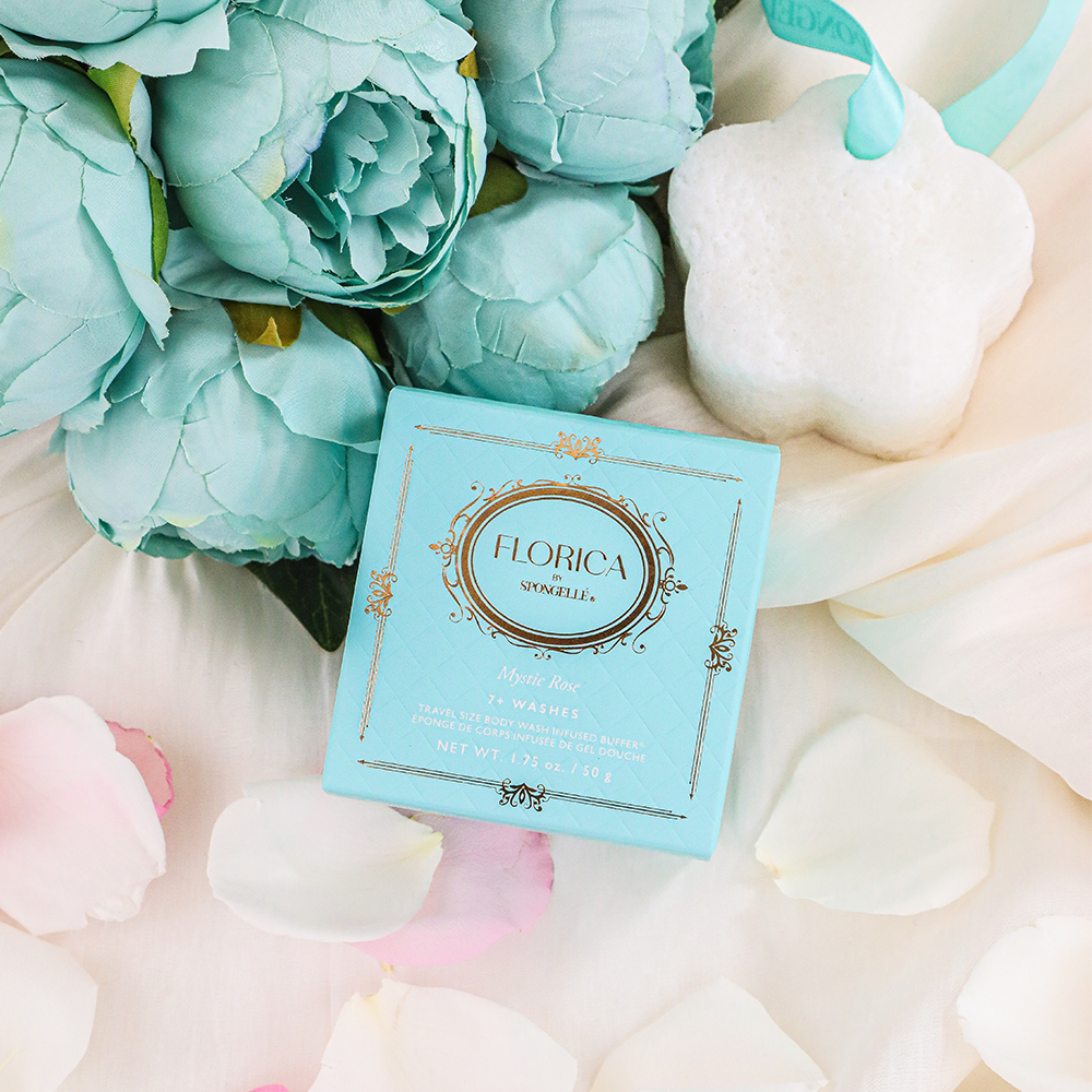 Mystic Rose Spongette by Spongellé, a body wash-infused buffer with a textured sponge for gentle cleansing and fragrant rose scent.