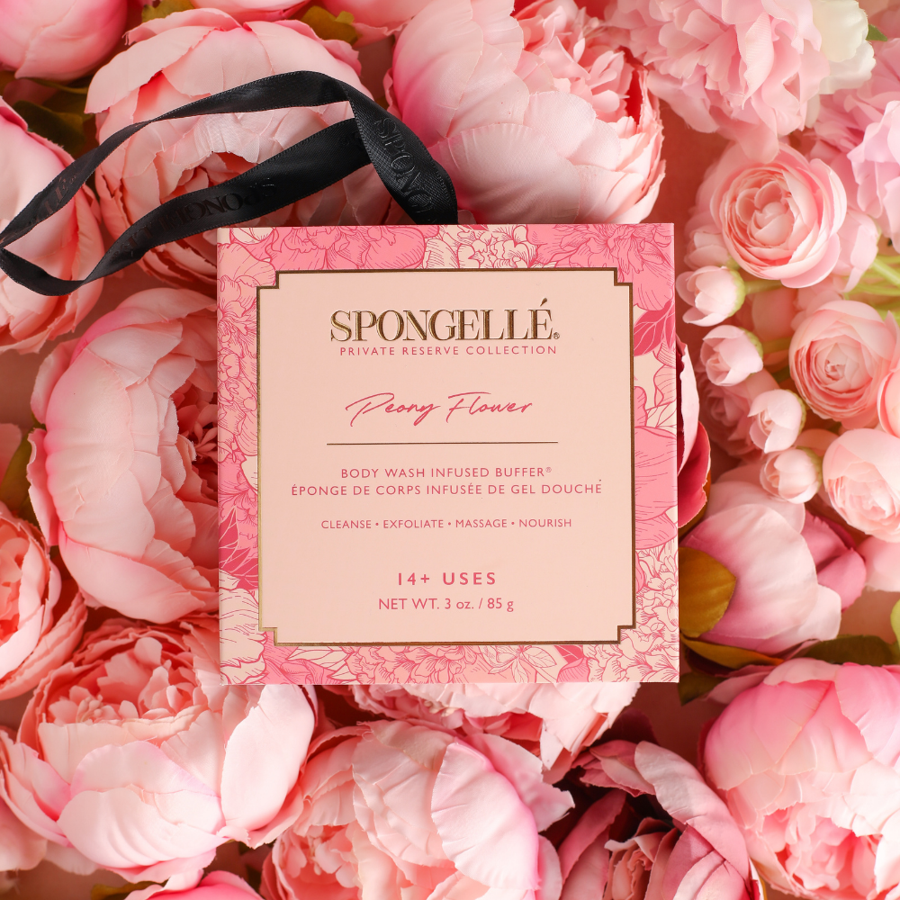 Spongellé Peony Flower body wash-infused buffer in a boxed floral design, soft pink and white peony pattern visible.