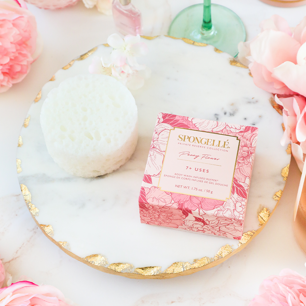 Peony Flower Spongette body wash infused buffer by Spongellé, soft sponge with floral scent and textured surface for gentle cleansing.