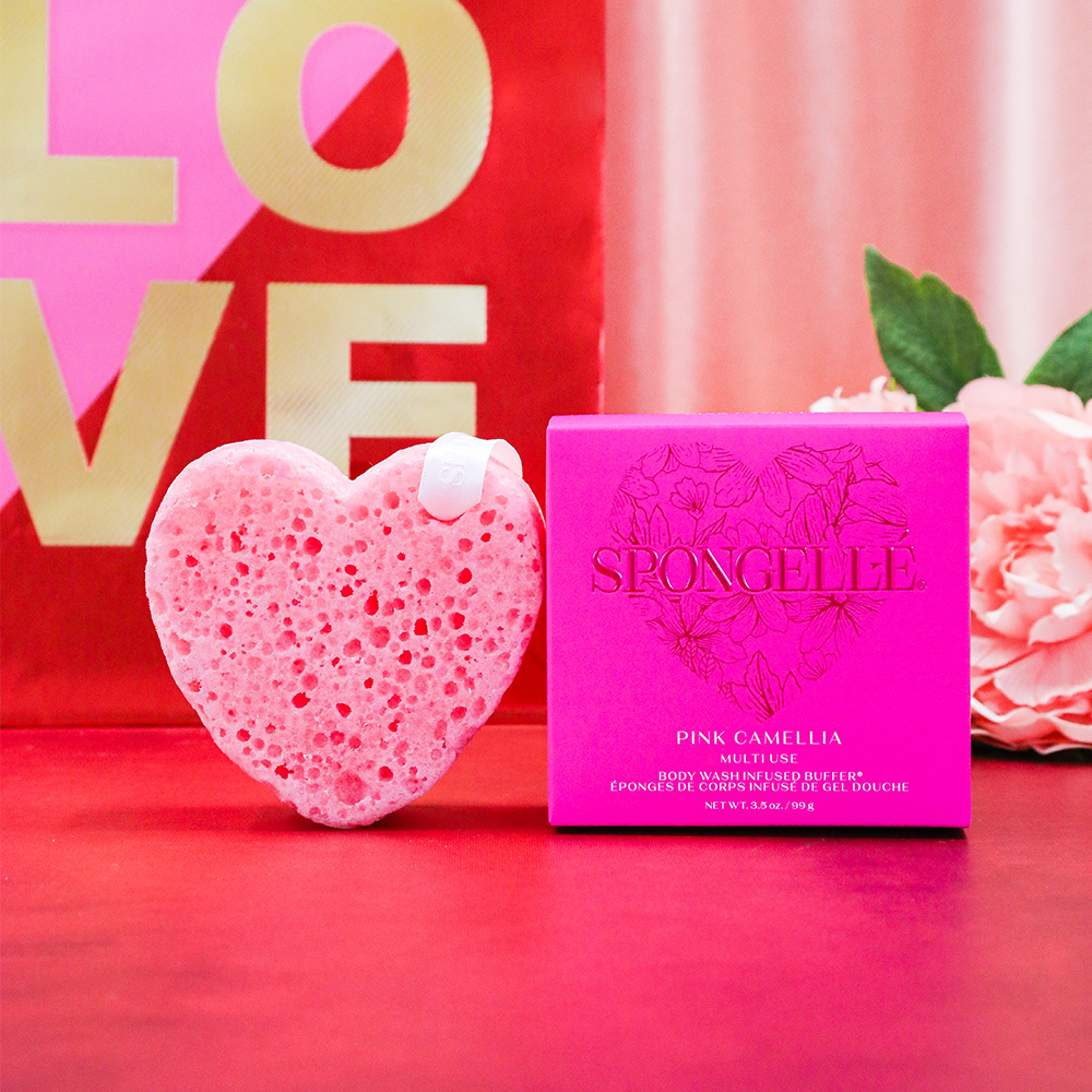 Pink Camellia Spongellé body wash infused buffer shaped like a heart for gentle cleansing and exfoliation.