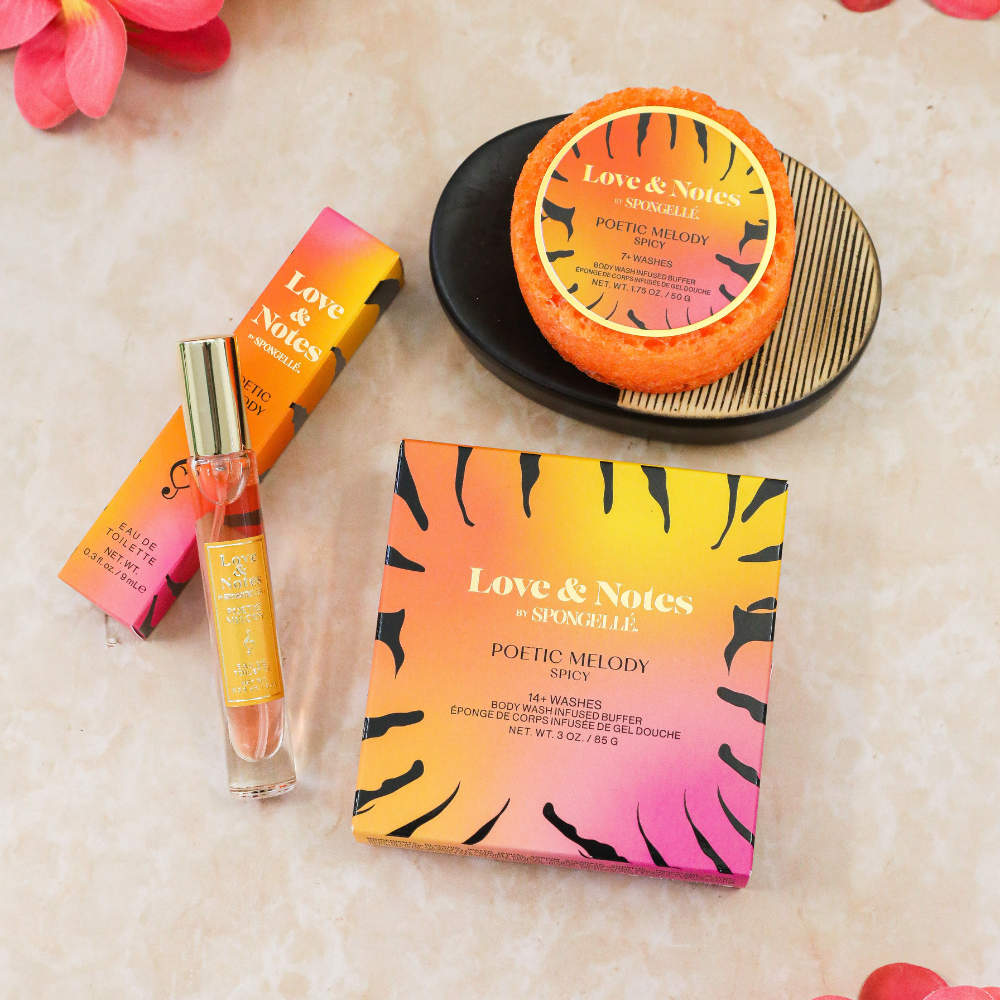 Spongellé Poetic Melody Love & Notes Trio Set with body wash-infused buffers in floral packaging, designed for gentle cleansing and fragrance.