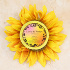 Spongellé Love & Notes Primal Motif body wash-infused buffer sponge with floral design and textured surface for gentle cleansing.