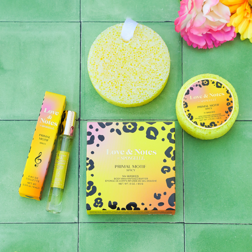 Spongellé Love & Notes Trio Set with body wash-infused buffers featuring primal motif and floral design for skincare and exfoliation.