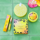 Spongellé Love & Notes Trio Set with body wash-infused buffers featuring primal motif and floral design for skincare and exfoliation.