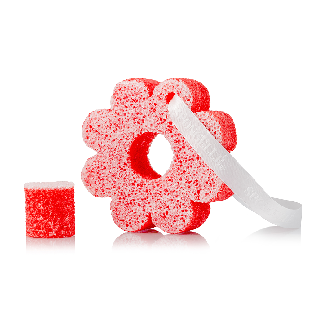 Spongellé Pua Kenikeni Hawaiian body wash infused buffer with floral scent, showing the textured sponge and vibrant packaging.