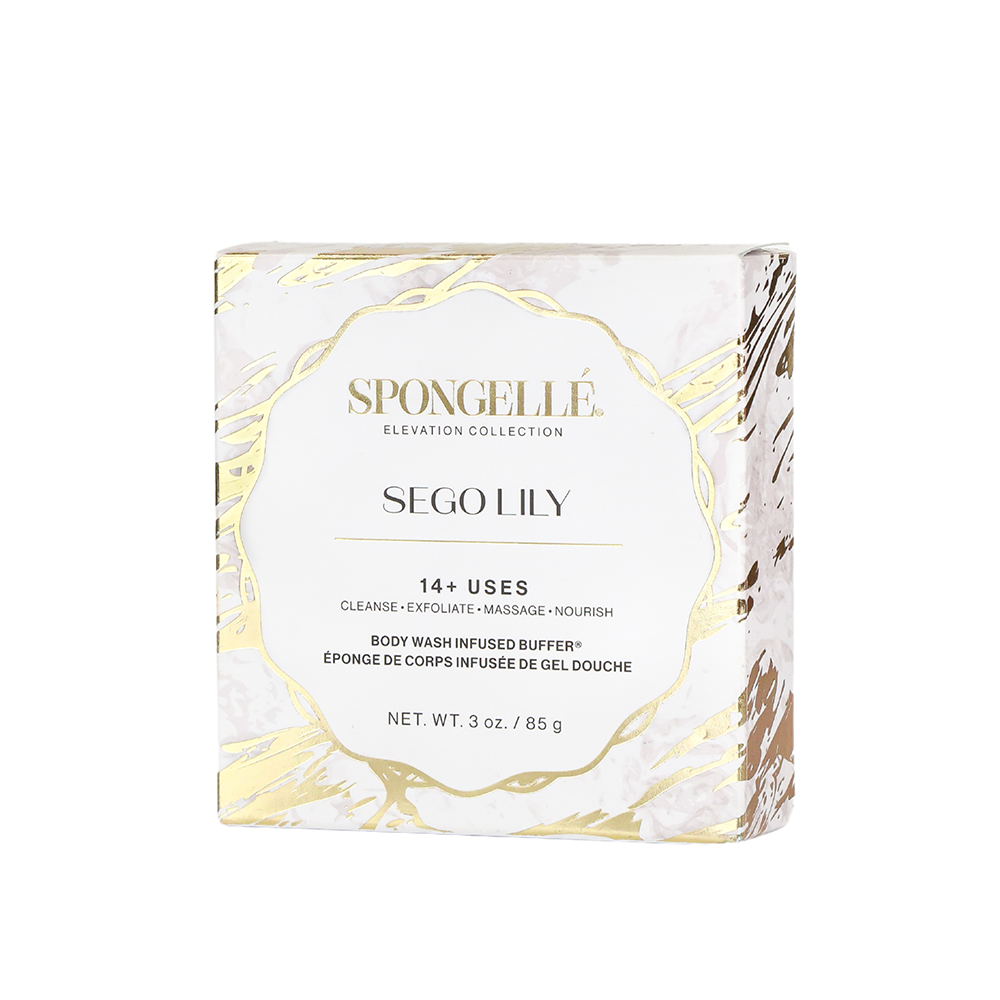 Spongellé Sego Lily Elevation Body Wash Infused Buffer with boxed flower design, showcasing a floral body care product.