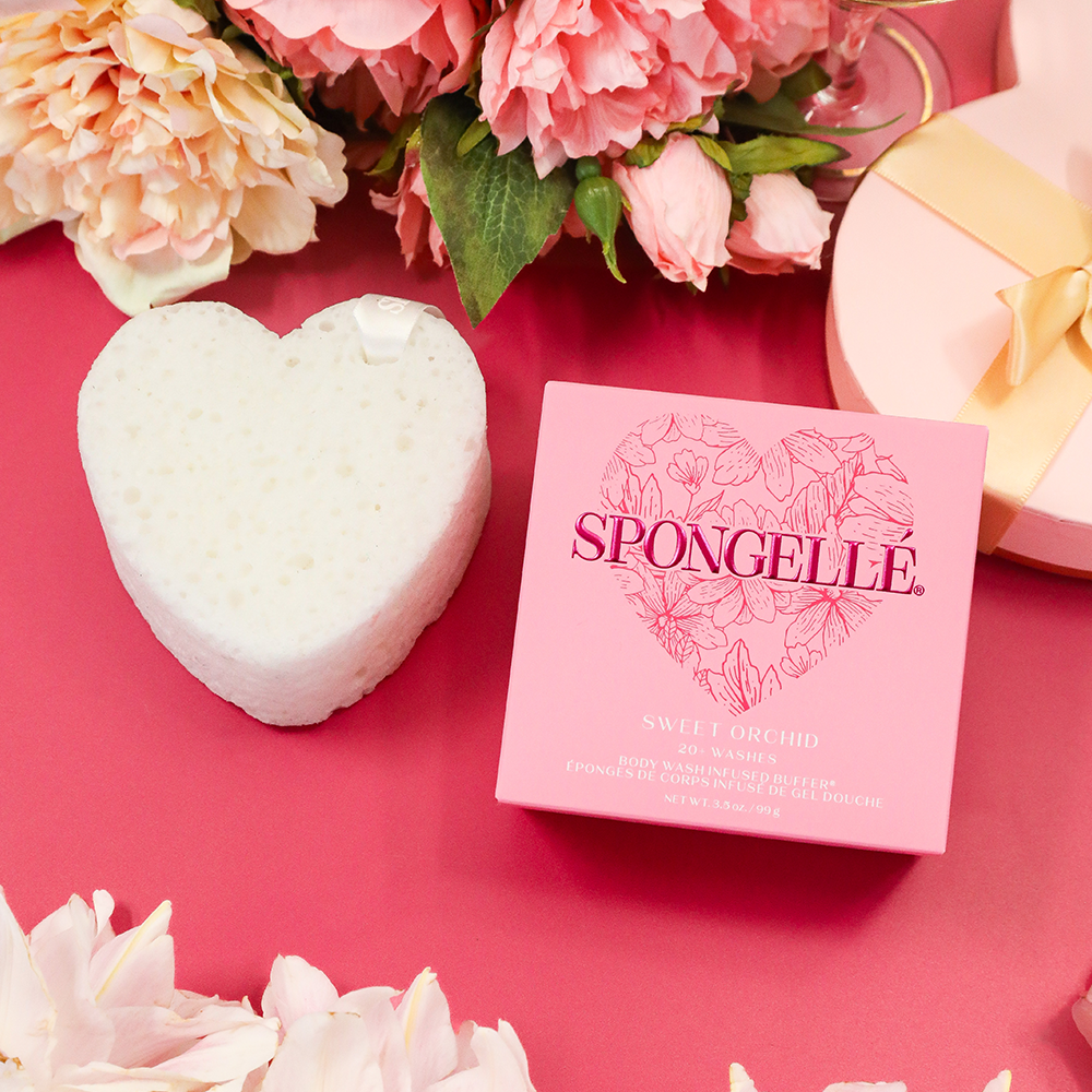 Spongellé Sweet Orchid Heart Buffer, a body wash infused buffer with floral scent, showing a pink heart-shaped sponge.