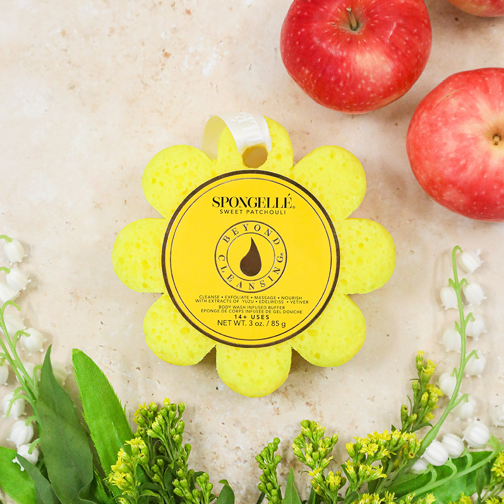 Spongellé Sweet Patchouli Wild Flower body wash-infused buffer with floral and patchouli scent, textured exfoliating sponge.