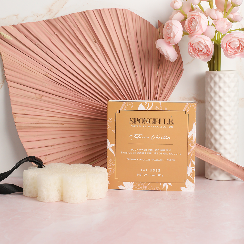 Spongellé Tobacco Vanilla Body Wash Infused Buffer in boxed flower packaging showing the elegant buffer sponge.