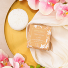 Spongellé Tobacco Vanilla body wash-infused buffer sponge with soft texture and vanilla scent for gentle cleansing.
