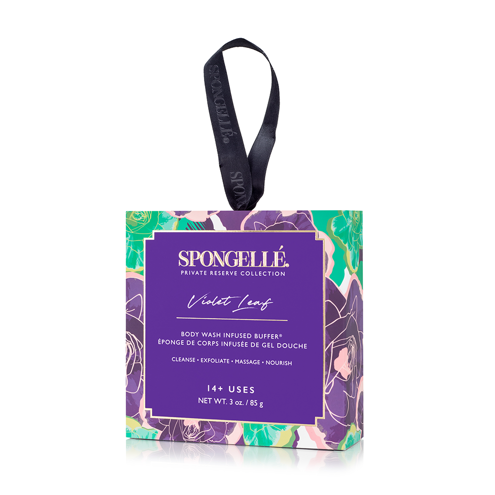 Spongellé Violet Leaf Body Wash Infused Buffer with floral packaging, soft sponge texture, and violet leaf scent.