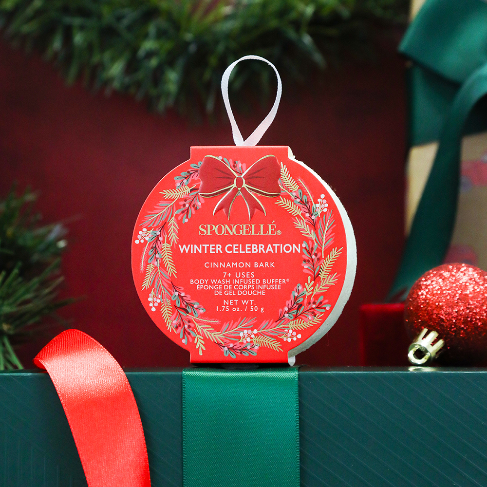 Spongellé Winter Celebration Cinnamon Bark Body Wash Infused Buffer with holiday wreath design, festive scent and soft exfoliating texture.