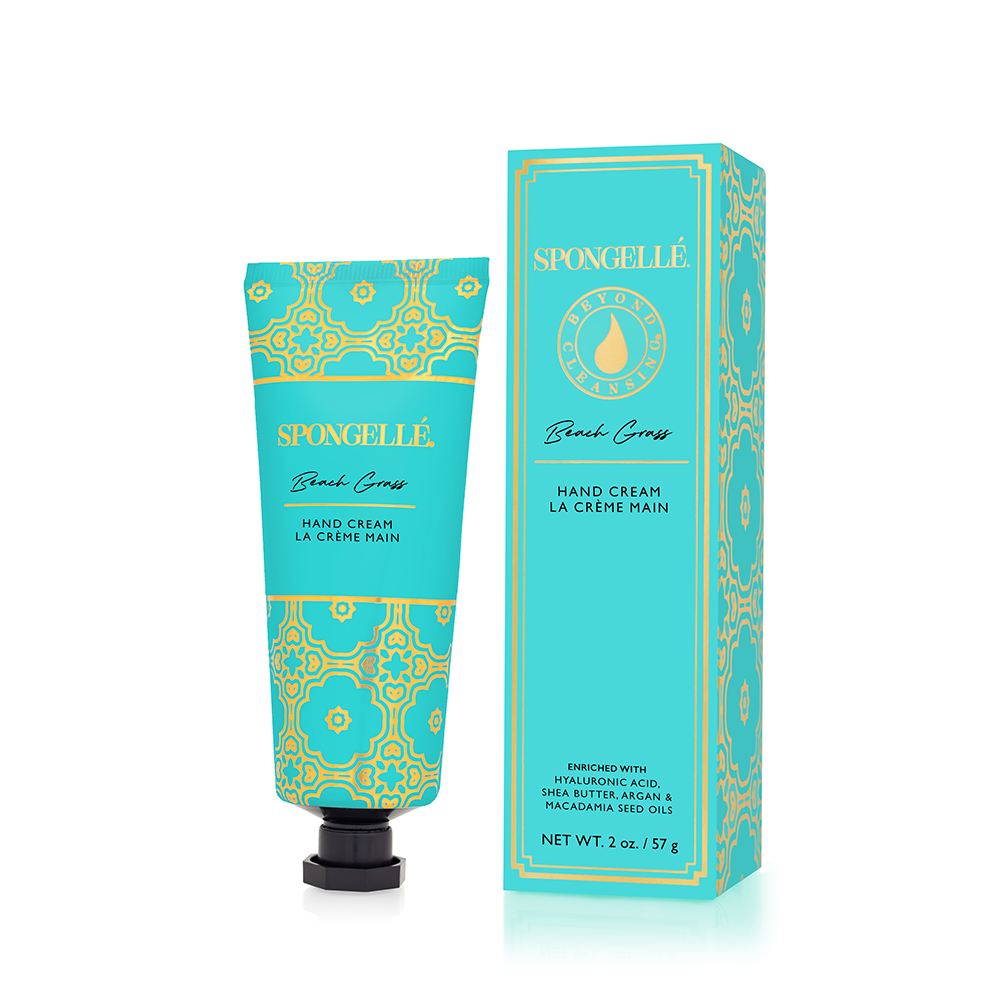 Spongellé Beach Grass hand cream in a sleek tube, featuring a floral and grassy design, perfect for nourishing skin.