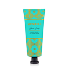 Spongellé Beach Grass hand cream in a tube with a floral and grass design, showcasing its moisturizing formula and natural ingredients.