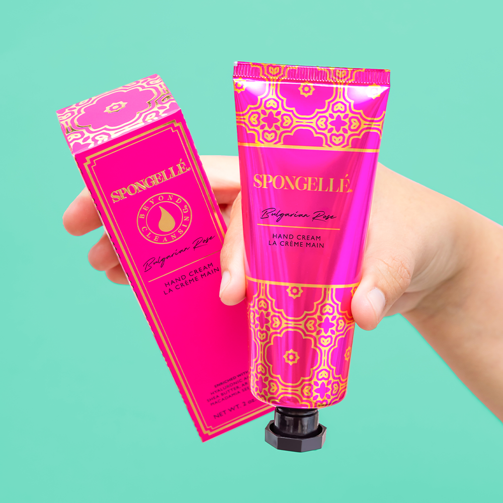 Spongellé Bulgarian Rose hand cream in a sleek tube, featuring a floral design and soft pink packaging.