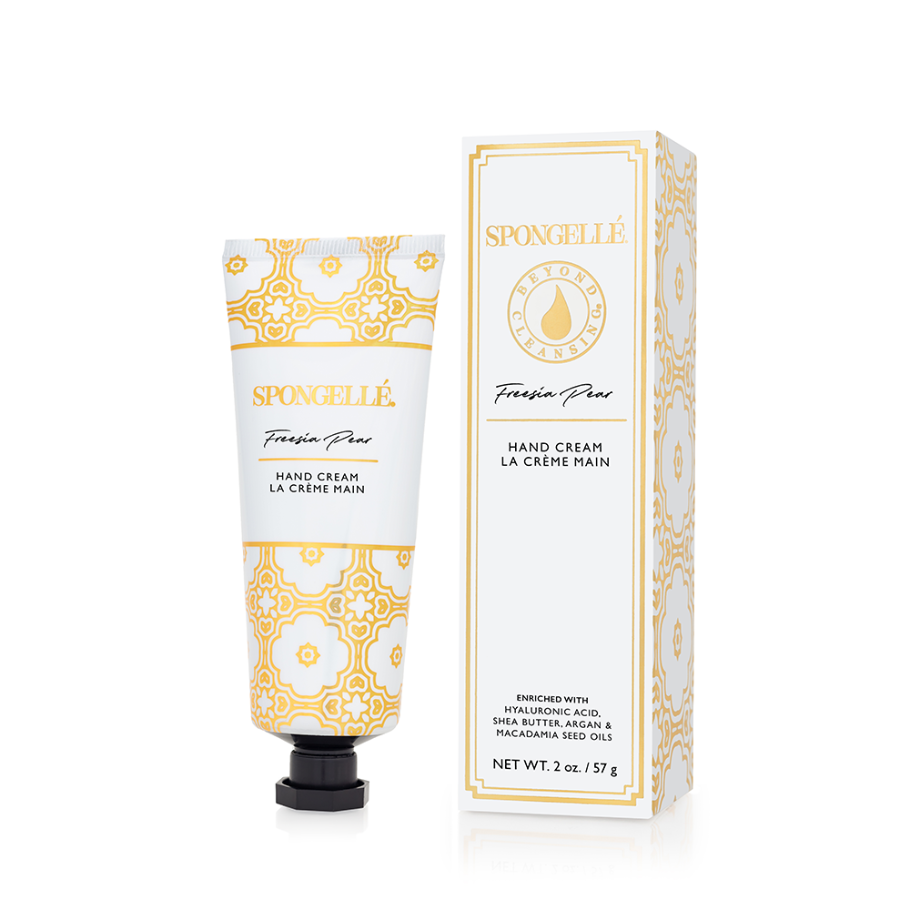 Spongellé Freesia Pear hand cream tube with floral design, moisturizing and nourishing skincare for hands.