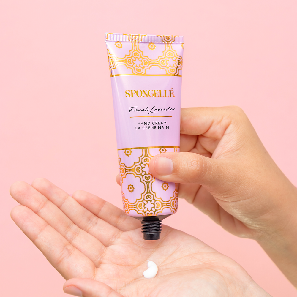 Spongellé French Lavender hand cream with a white tube and lavender accents, designed for nourishing and moisturizing hands.