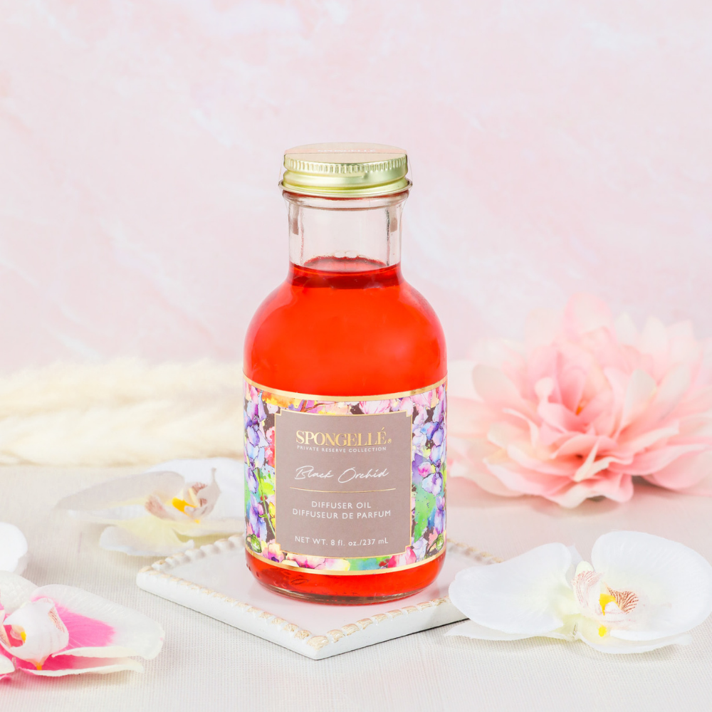 Spongellé Black Orchid diffuser oil from the Private Reserve Collection, a home fragrance with a dark floral scent.