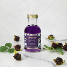 Spongellé Blackberry Diffuser Oil from Private Reserve Collection, a home fragrance with a rich blackberry scent in a decorative bottle.