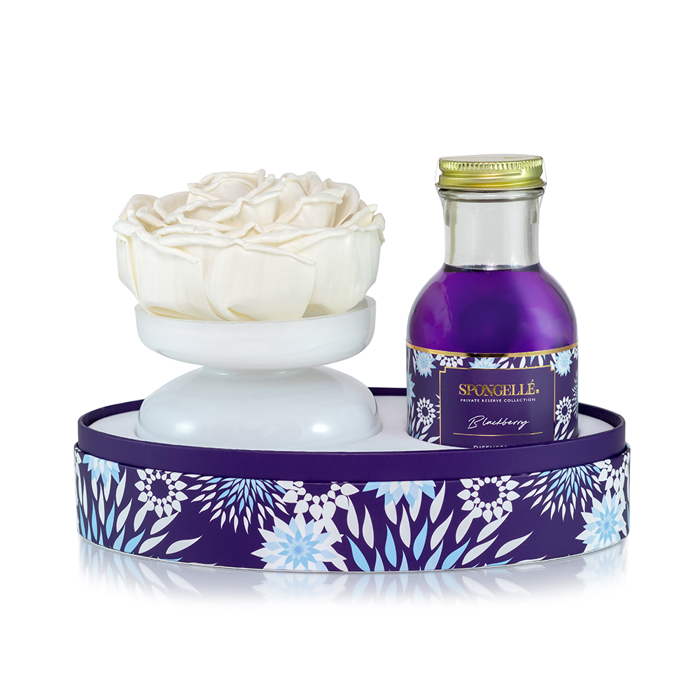 Spongellé Blackberry Private Reserve diffuser for home fragrance, with a sleek glass bottle and blackberries for a fresh scent.