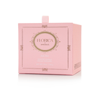 Spongellé Jude Rose Candle by Florica, a home fragrance candle with a soft rose scent, in a stylish glass holder.