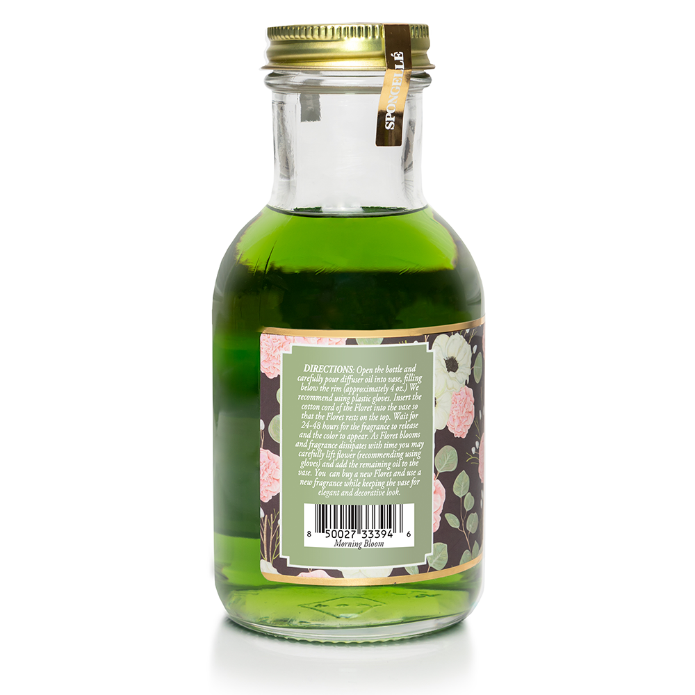 Spongellé Morning Bloom Diffuser Oil from the Private Reserve Collection, a home fragrance with a floral scent in a glass bottle.