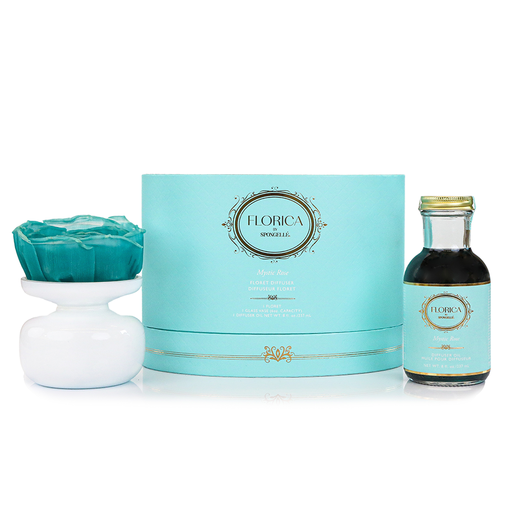 Mystic Rose Floret Diffuser by Florica, a Spongellé home fragrance with a glass bottle and fresh rose scented reeds.
