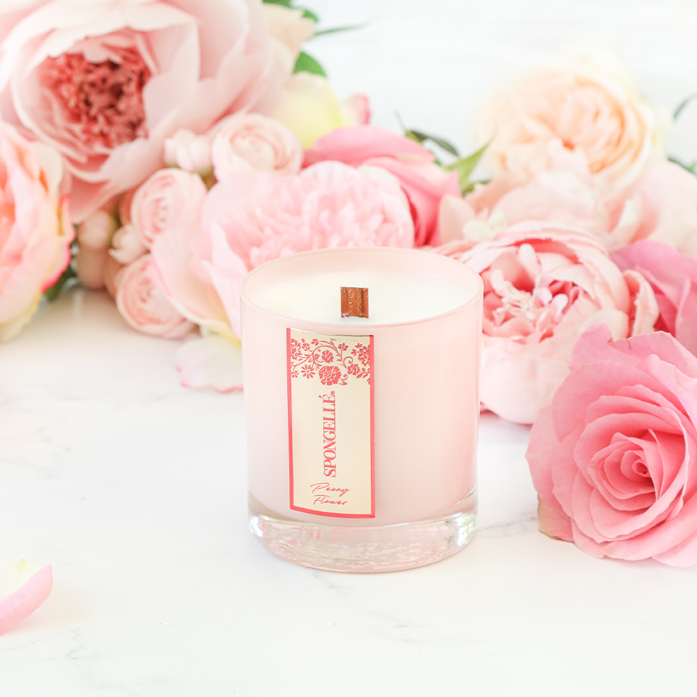 Spongellé Private Reserve Candle with Peony Flower scent, showcasing a elegant home fragrance candle in a decorative container.