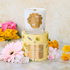 Spongellé Petitgrain Botanica candle, a home fragrance with a natural citrus scent, in a stylish glass container.