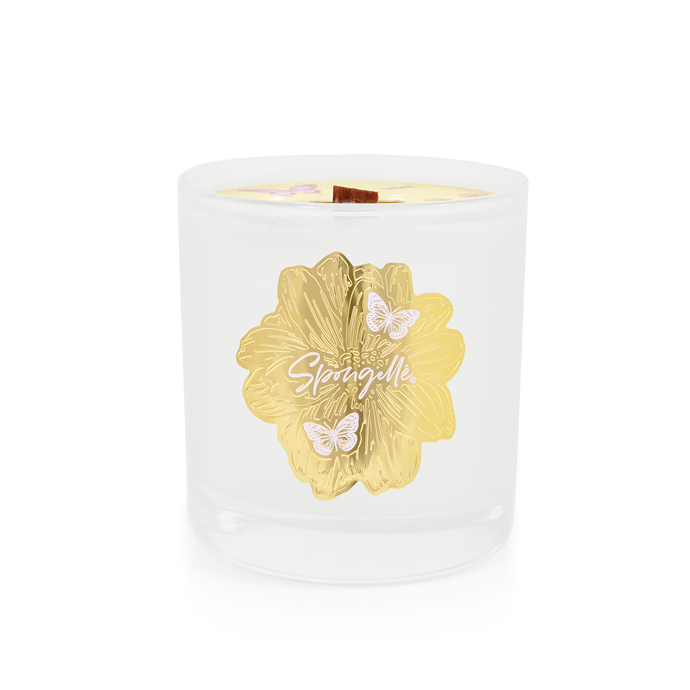 Spongellé Petitgrain Botanica candle in a clear glass jar, showcasing the natural home fragrance with a botanical design.