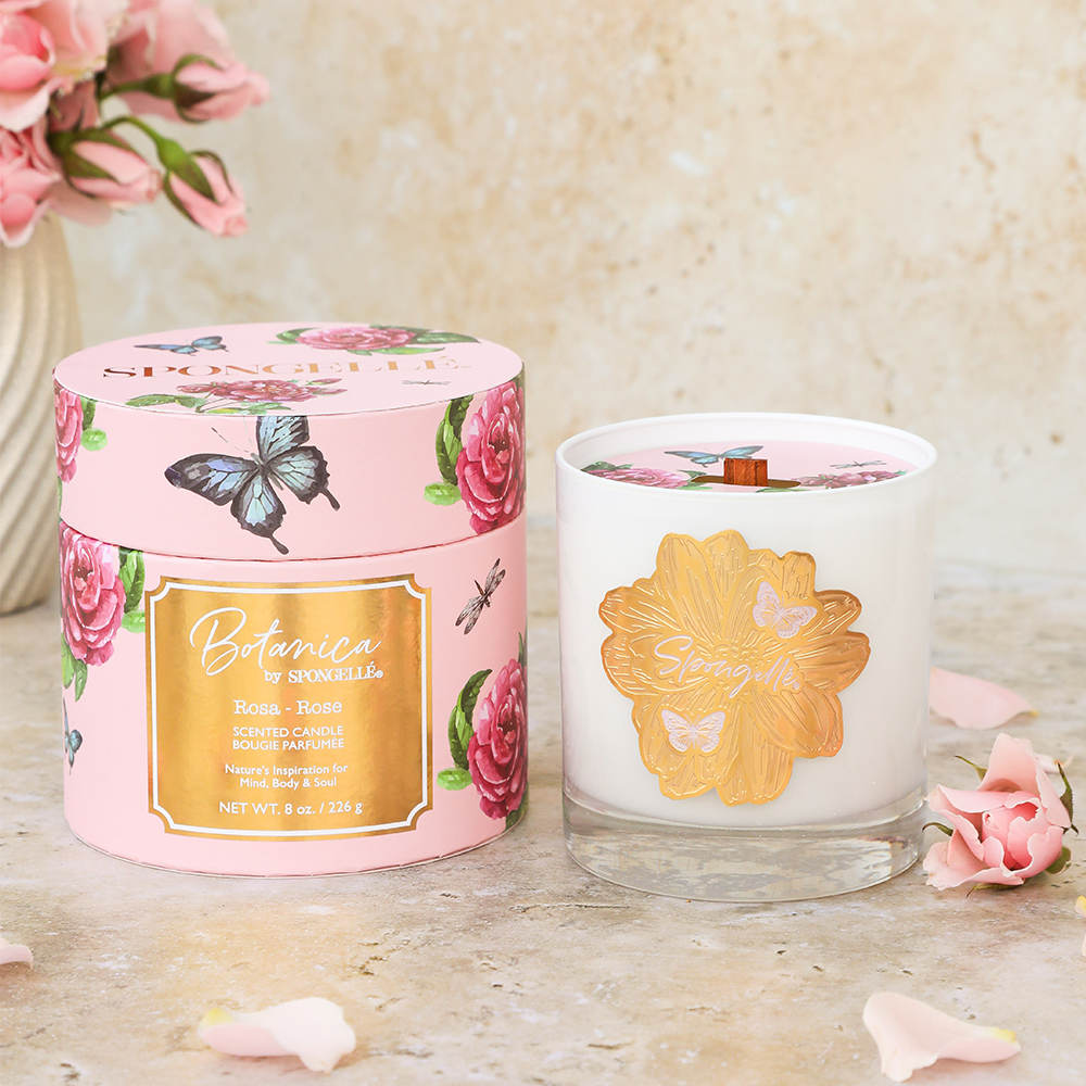 Spongellé Botanica Rose Candle, a home fragrance with a elegant glass holder and a blooming rose design.