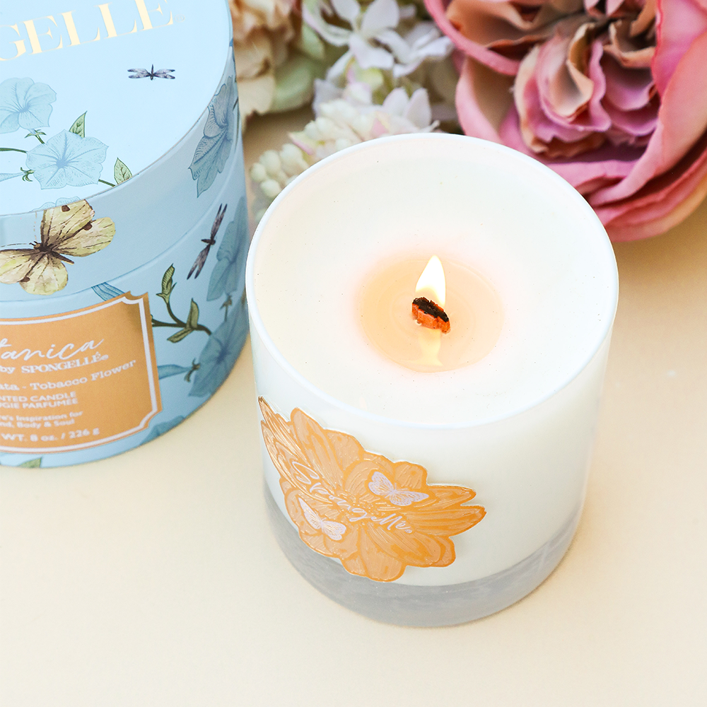 Botanica Candle by Spongellé with Tobacco Flower scent, a home fragrance featuring a stylish candle in a decorative container.