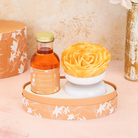 Spongellé Tobacco Vanilla Private Reserve diffuser with a sleek glass bottle and elegant reed sticks for home fragrance.