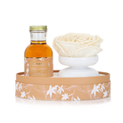 Spongellé Tobacco Vanilla Private Reserve diffuser for home fragrance, featuring a sleek glass bottle with a reed stick.