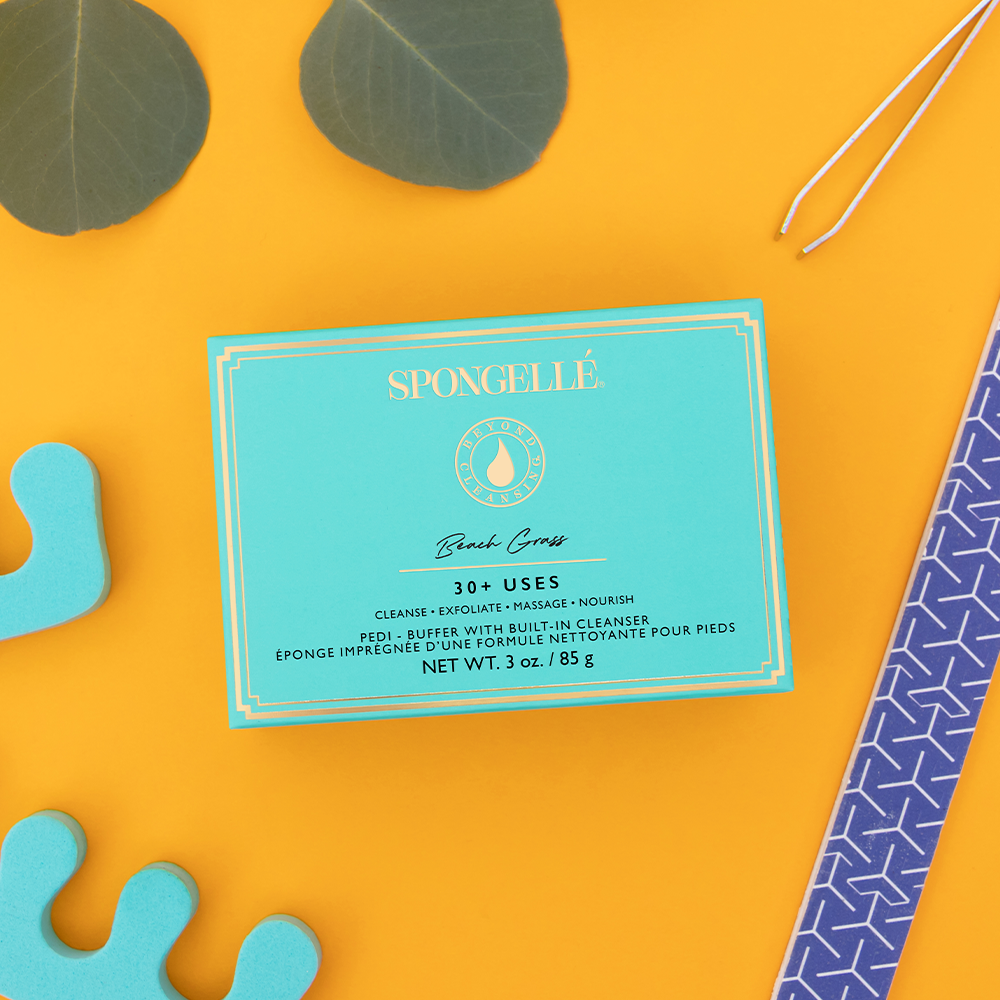 Spongellé Beach Grass Pedi Buffer exfoliating tool with textured surface for smooth, refreshed feet.