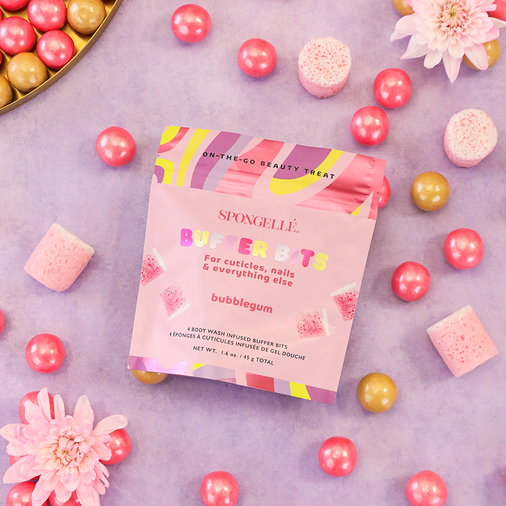 Spongellé PediPOP! Bubblegum Pedi Buffer Bits for smoothing and exfoliating feet, featuring bright pink and textured surface.