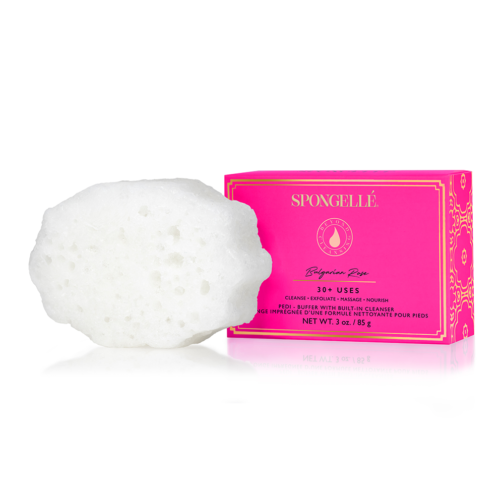 Spongellé Bulgarian Rose Pedi Buffer with pink and white textured surface for gentle foot exfoliation and skincare.