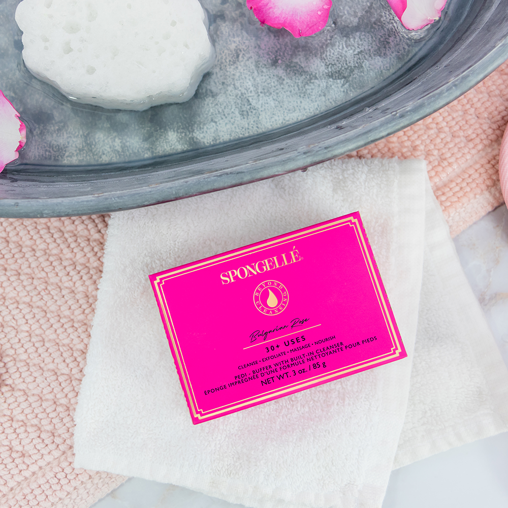 Spongellé Bulgarian Rose Pedi Buffer with floral design for exfoliating and smoothing feet.