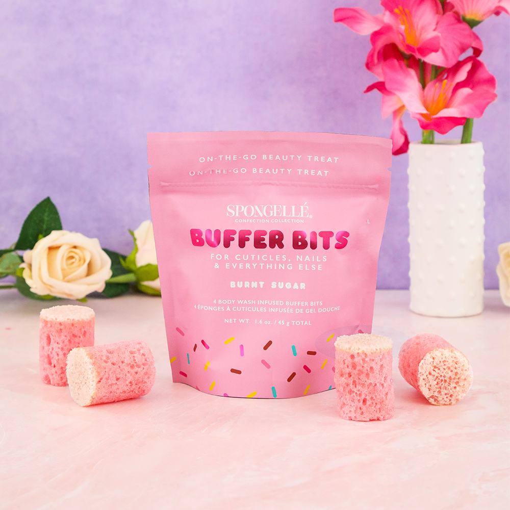 Spongellé Burnt Sugar Pedi Buffer Bits for smoothing and exfoliating skin, featuring a textured buffer surface.