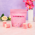 Spongellé Burnt Sugar Pedi Buffer Bits for smoothing and exfoliating skin, featuring a textured buffer surface.