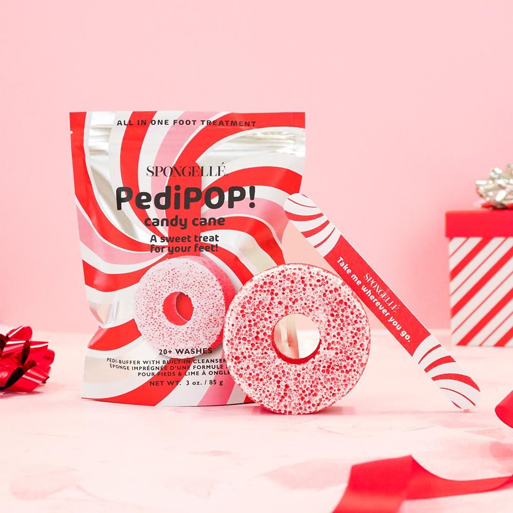 Spongellé Candy Cane Pedi Buffer and Nail File for holiday-themed foot care and nail grooming.