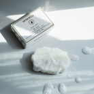 Spongellé Freesia Pear Pedi Buffer for gentle exfoliation and smooth skin in a compact, floral-scented design.
