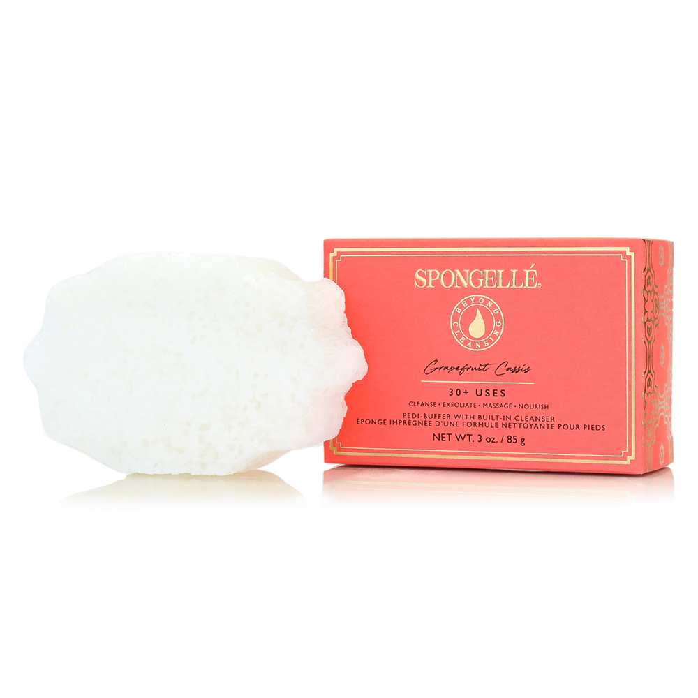 Spongellé Grapefruit Cassis Pedi Buffer showing textured surface for exfoliating feet and citrus scent design.