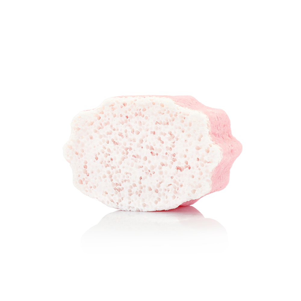 Spongellé Jude Rose Pedi Buffer from Florica featuring a soft pink textured surface for gentle foot exfoliation.