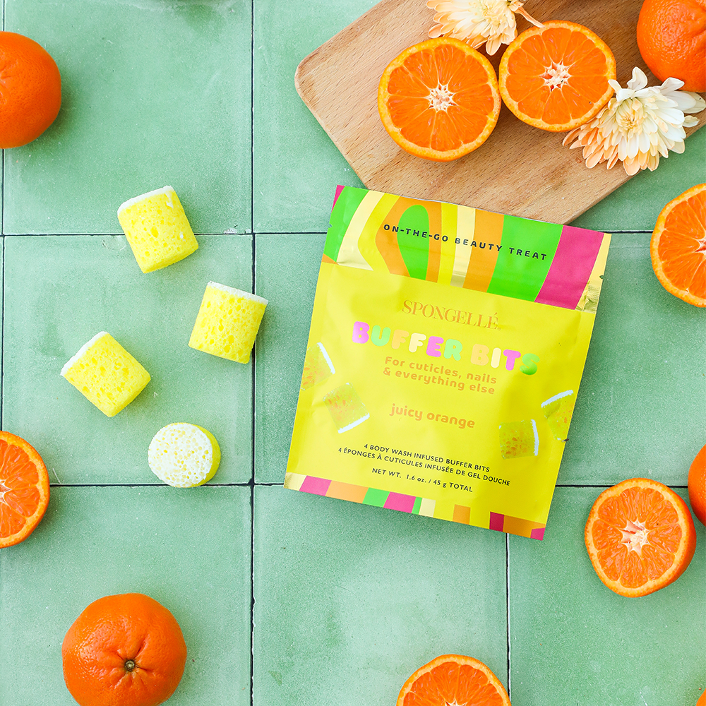 Spongellé PediPOP! Juicy Orange Pedi Buffer Bits for smooth, exfoliated skin during pedicures with vibrant orange design.