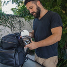 Black Spongellé travel case with zipper closure, compact and durable for organizing toiletries on the go.