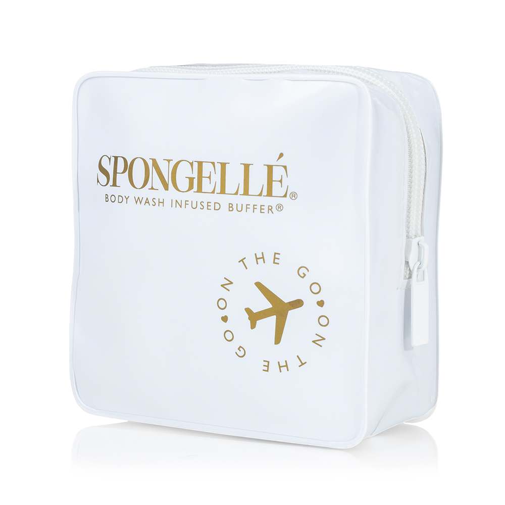 White Spongellé travel case with a compact, protective design for storing toiletries and travel essentials.