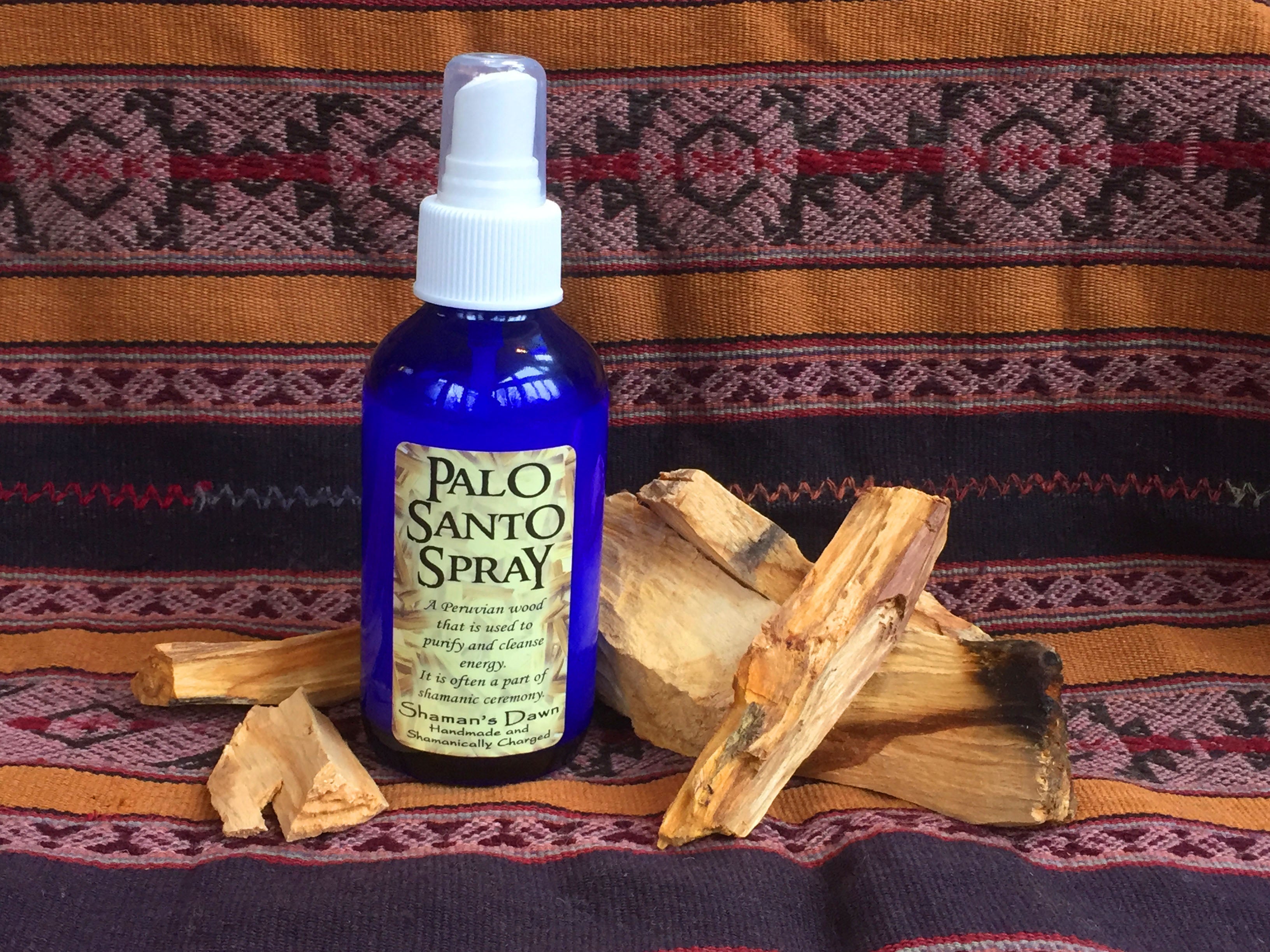 Shamans Dawn Palo Santo spray bottle with a spray nozzle, ready for aromatic use and spiritual cleansing.