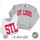 Reversible St. Louis Sport Grey crewneck sweatshirt by The Graphic Tee, featuring casual, comfortable design with graphic details.